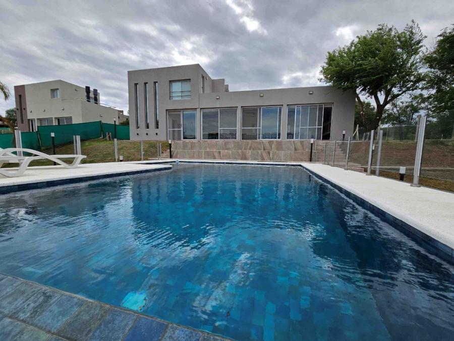 Foto Casa en Venta en SOLARES DE LAS ENSENADAS, Villa Carlos Paz, Cordoba - U$D 520.000 - CAV100362 - BienesOnLine